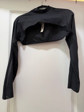 VSX black shrug top